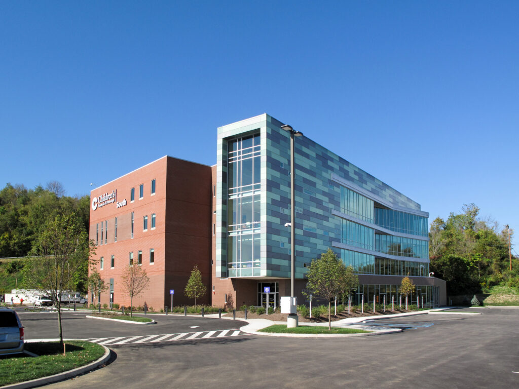 Children’s Hospital of Pittsburgh South building exterior with a brick and teal paneled facade.