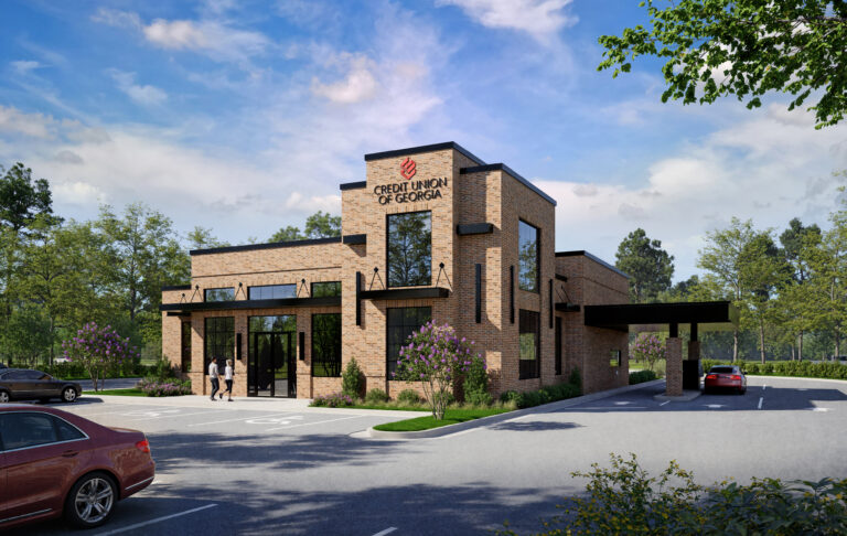 Exterior of a brick Credit Union of Georgia building with a drive-thru lane and parking lot.