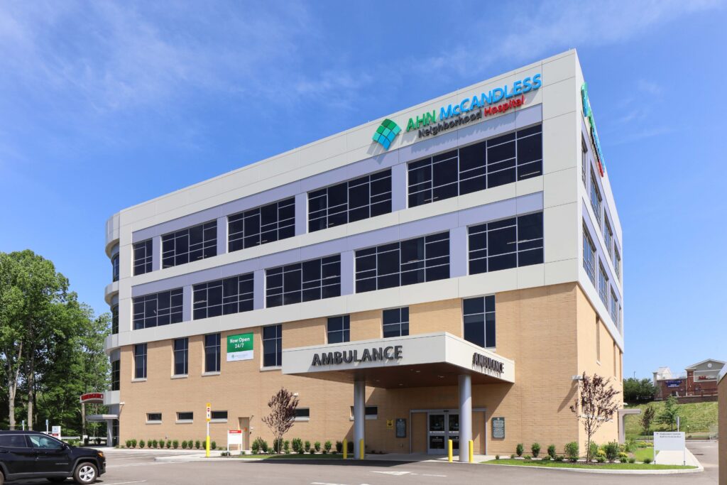 AHN McCandless Neighborhood Hospital building with an ambulance entrance bay.