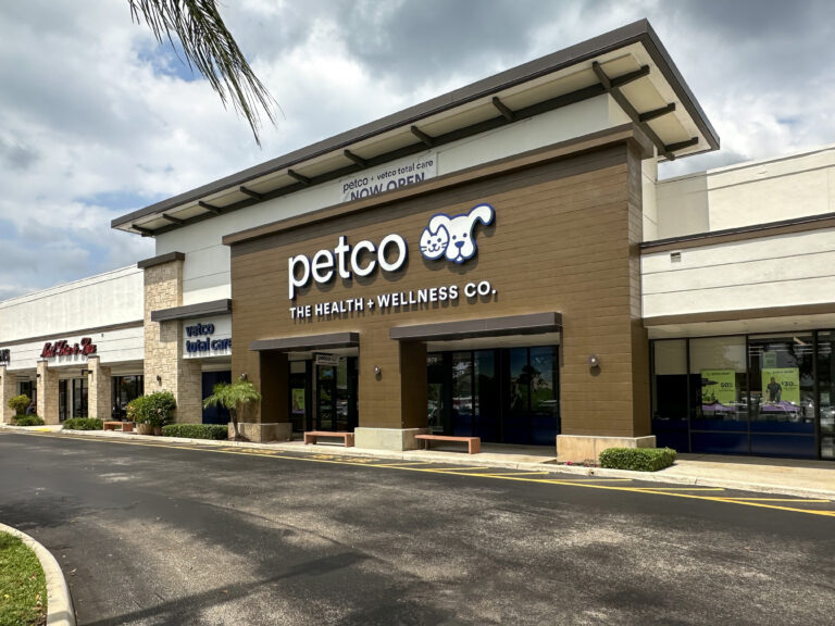 The storefront of a Petco pet store in a shopping center.