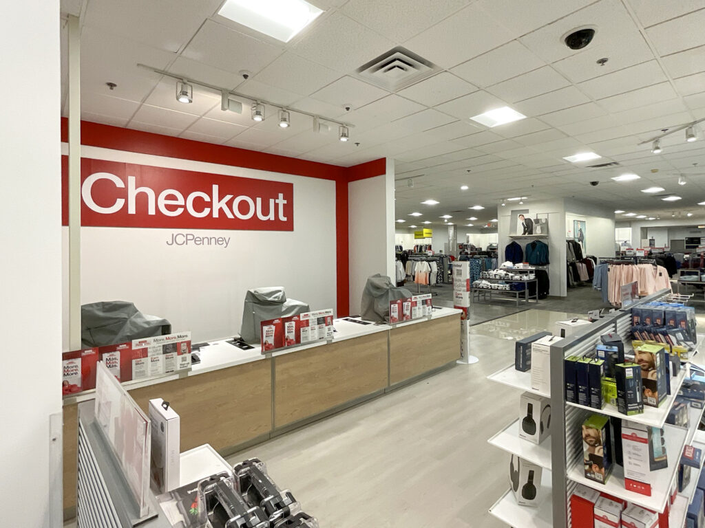 Checkout counter inside a JCPenney store.