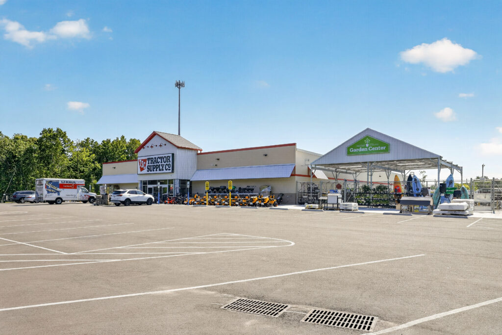 Tractor Supply Co. store with an outdoor garden center and a parking lot.