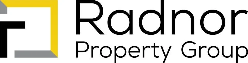 Logo for Radnor Property Group featuring an abstract square icon made of black, grey, and yellow segments.